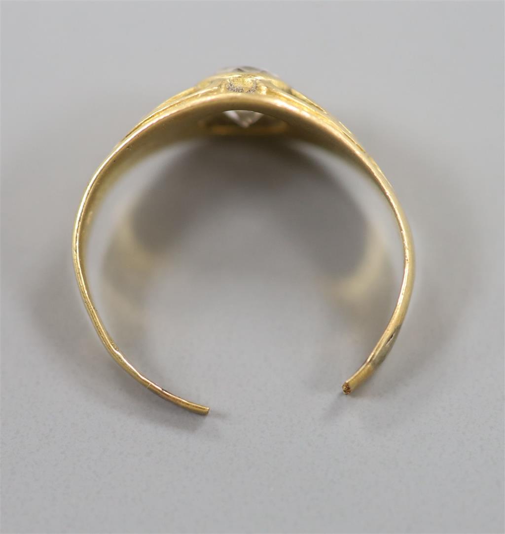 A yellow metal(tests as 18ct) and white stone set ring, cut, gross 2.2 grams.